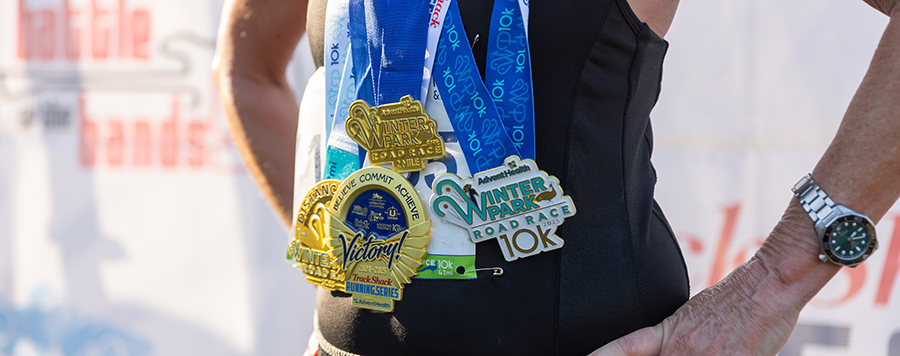 Three finisher medals